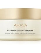 Ahava Niacinamide Even Tone Body Balm testbalzsam élénk és hidratált bőr 220 ml