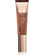 Charlotte Tilbury Beautiful Skin Foundation hidratáló alapozó árnyalat 13 Warm 30 ml