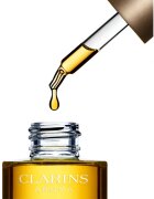 Clarins Lotus Treatment Oil kisimító hatású regeneráló olaj Nappali és éjjeli ápolás 30 ml