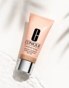 Clinique Moisture Surge™ Sheertint Hydrator SPF 25 tónusegyesítő hidratáló krém SPF 25 árnyalat Universal Light 40 ml
