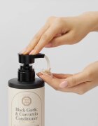 DAENG GI MEO RI Black Garlic & Curcumin Treatment tápláló kondicionáló a dús hajért és a hajvégek töredezése ellen 500 ml