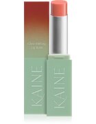KAINE Glow Melting Lip Balm hidratáló ajakbalzsam regeneráló hatással árnyalat #03 Warm Apricot 3.7 g