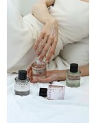 KUNDAL Objet Satin Glow Body Oil ápoló testolaj az intenzív hidratálásért illattal Linen Water 100 ml