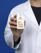 La Roche-Posay Anthelios UVMUNE 400 védő és tonizáló folyadék arcra SPF 50+ 50 ml