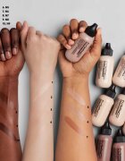MAC Cosmetics Studio Radiance Face and Body Radiant Sheer Foundation könnyű alapozó arcra és testre árnyalat N1 50 ml