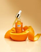 RoC Multi Correxion Revive + Glow bőrélénkítő szérum C-vitaminnal az arcra és a nyakra 30 ml
