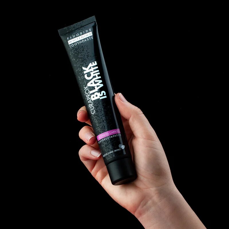Curaprox Black is White fogfehérítő fogkrém faszénnel hydroxyapatittel íz Fresh Lime-Mint 90 ml