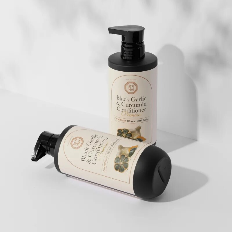 DAENG GI MEO RI Black Garlic & Curcumin Treatment tápláló kondicionáló a dús hajért és a hajvégek töredezése ellen 500 ml