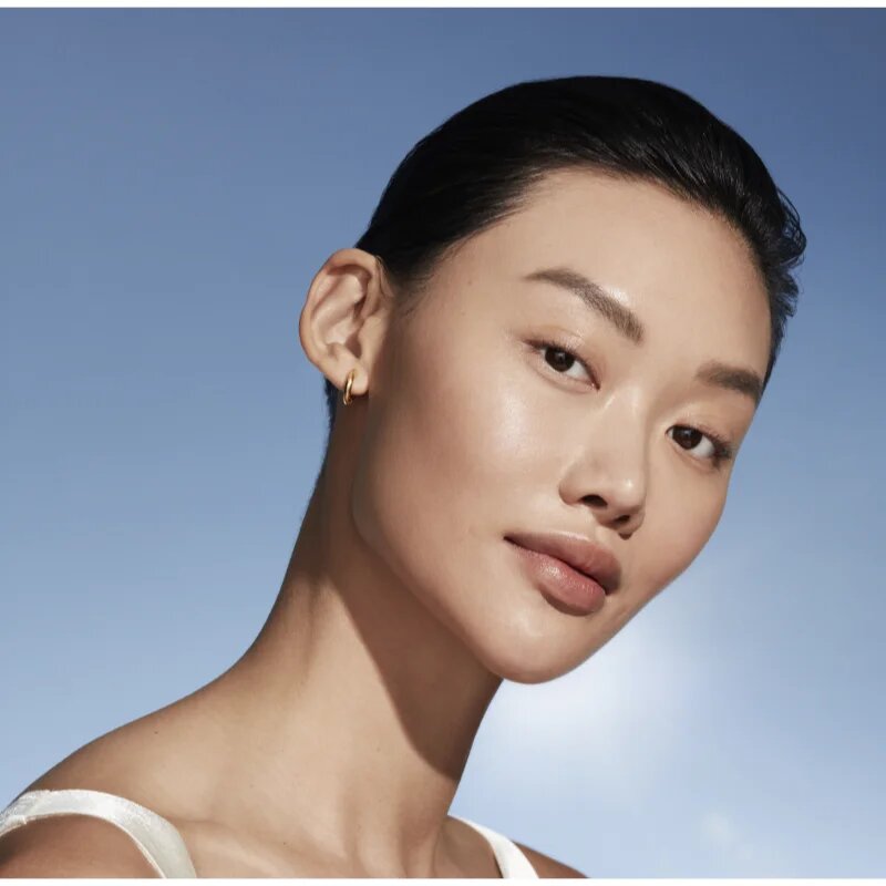 Estée Lauder Futurist SkinTint Serum Foundation With Botanical Oil Infusion SPF 20 ápoló alapozó SPF 20 árnyalat 2W1 Dawn 30 ml
