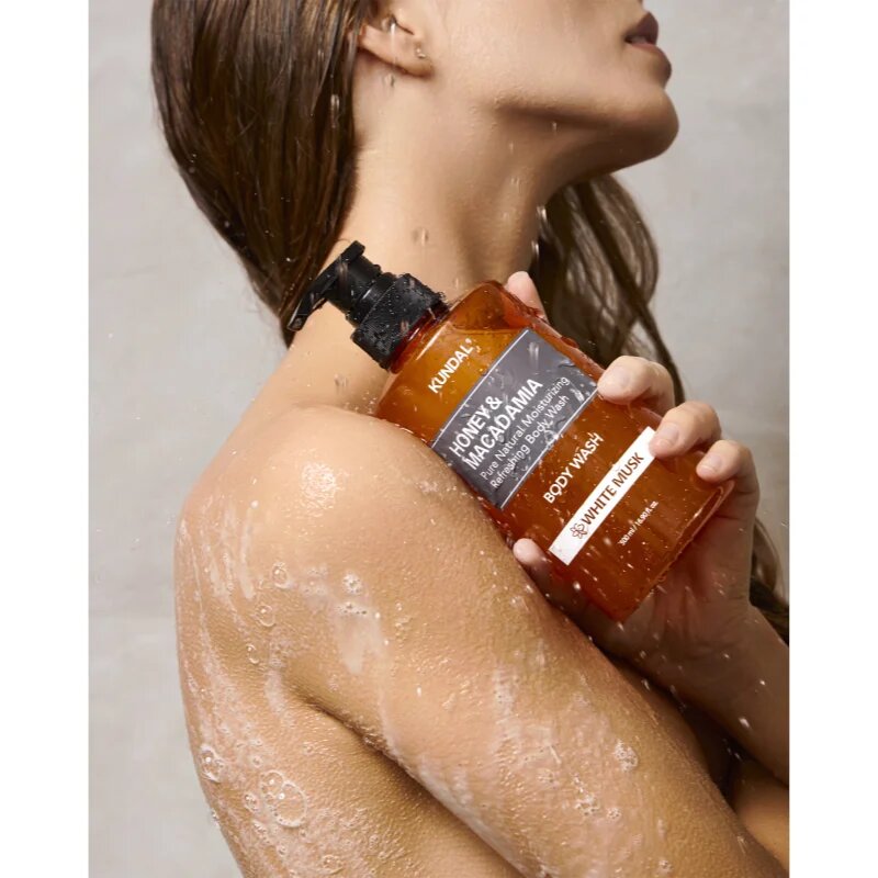 KUNDAL Honey & Macadamia White Musk gyengéd tusfürdő gél hidratáló hatással 500 ml