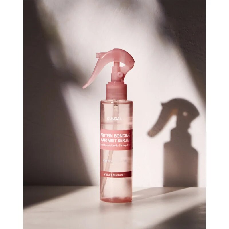 KUNDAL Protein Bonding Care Hair Mist Serum erősítő és regeneráló hajszérum száraz és sérült hajra illattal Violet Muguet 150 ml