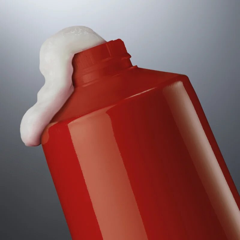 Redken Frizz Dismiss hővédő krém a rakoncátlan haj kisimítására 250 ml