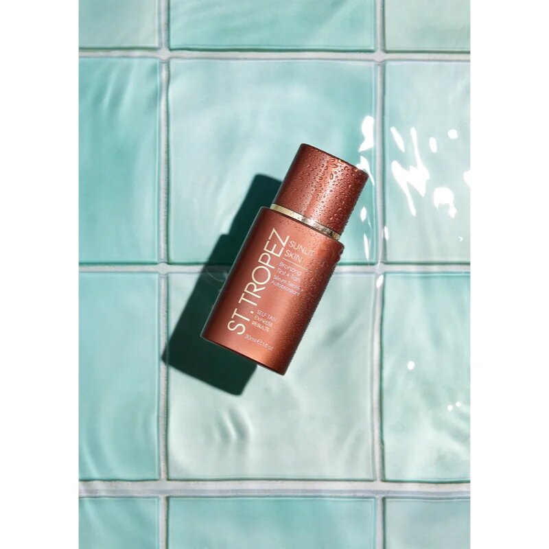 St.Tropez Sunlit Skin Bronzing Tint + Tan színezett önbarnító krém az arcra 1 db