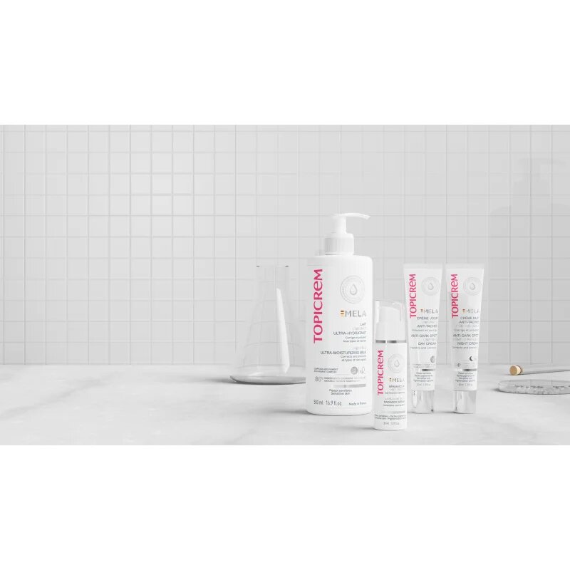 Topicrem MELA Unifying Ultra-Moisturizing Milk SPF15 hidratáló tej a pigment foltok ellen SPF 15 500 ml